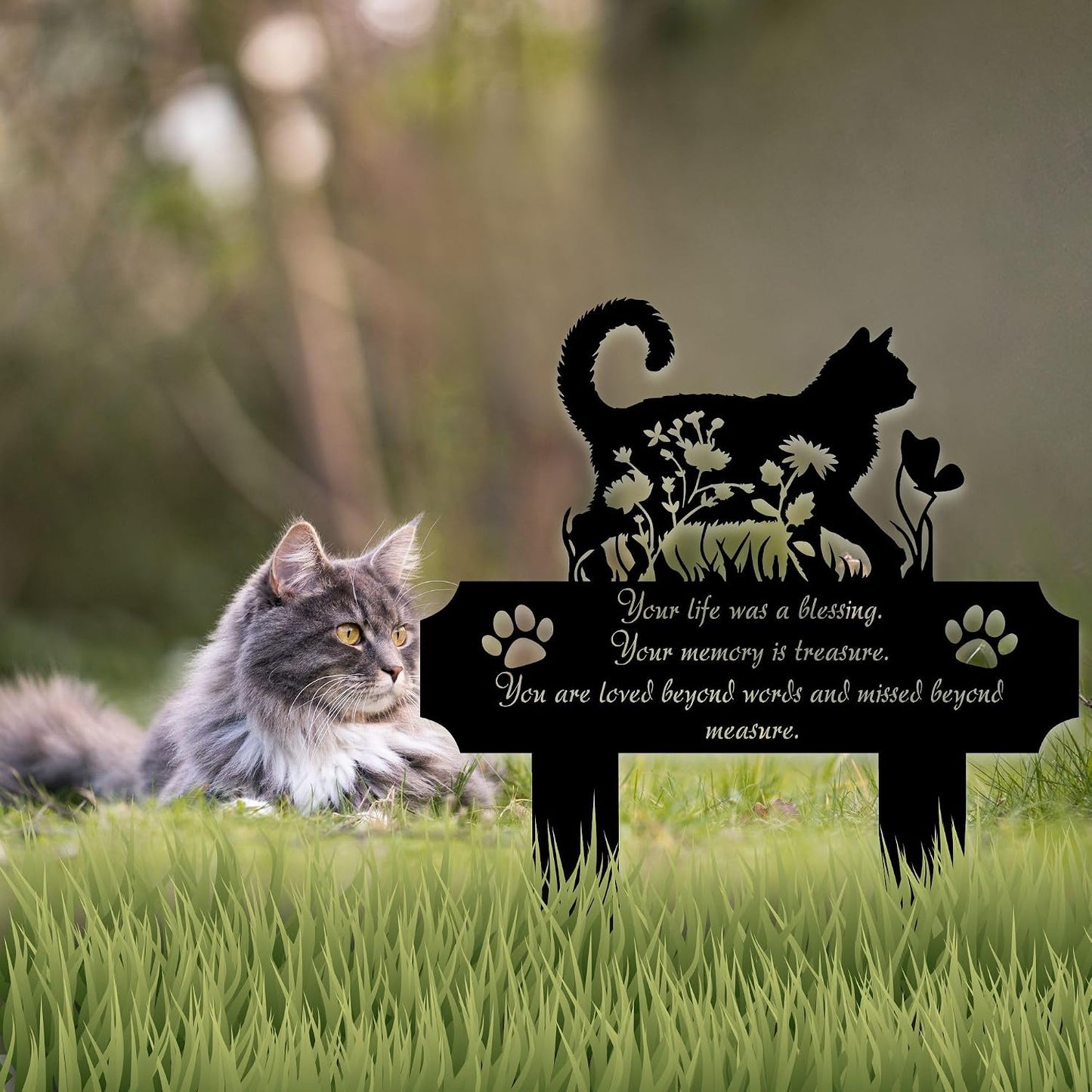 HEGANITS cat silhouette grave marker standing securely in a large outdoor patio flower pot
