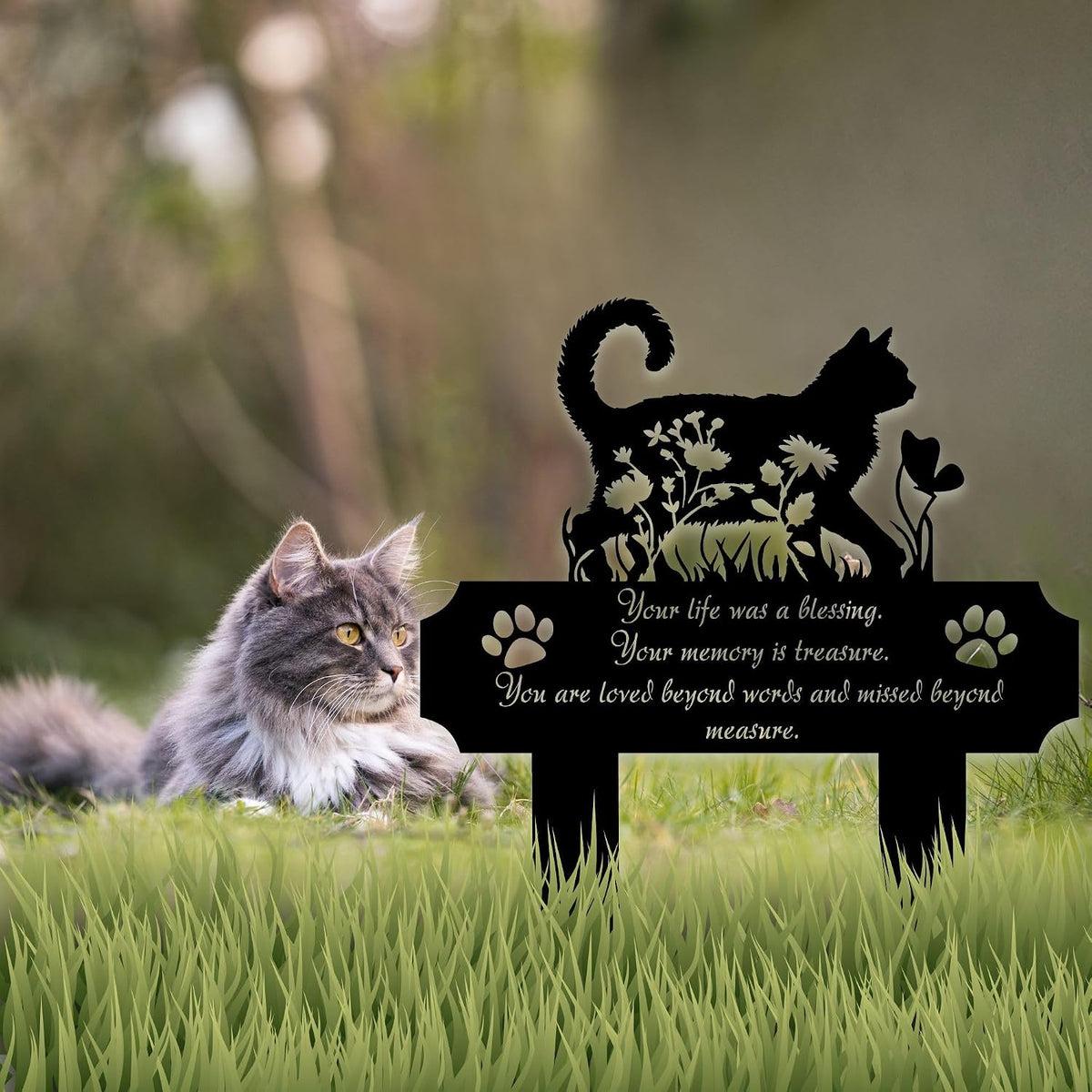 HEGANITS cat silhouette grave marker standing securely in a large outdoor patio flower pot