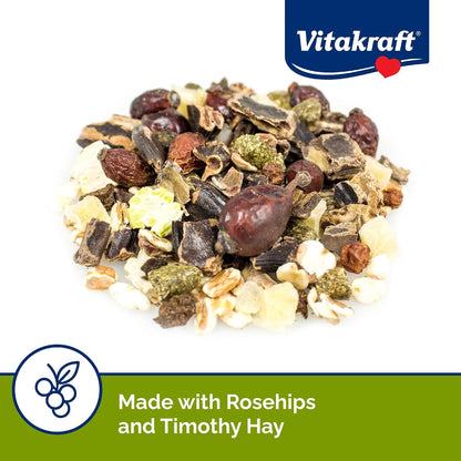 Close-up of corn-free small animal treat with timothy hay pellets and mountain ash berries.