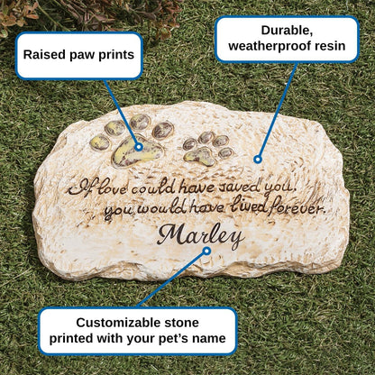 Close up view of the etched paw prints and sympathy poem on the weatherproof memorial plaque