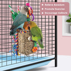 Side view of Katumo bird toy showing woven seagrass basket structure
