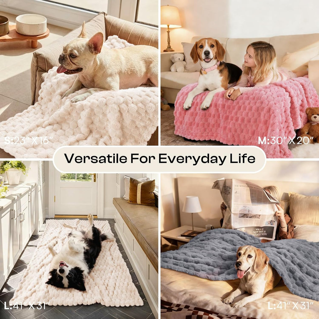 Luciphia washable dog blanket being placed inside a plastic pet travel crate