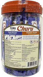 Close-up of individual squeezable cat treat tubes arranged neatly