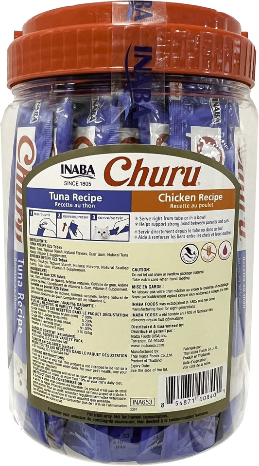 Inaba Churu lickable cat treat tube being hand fed to a cat