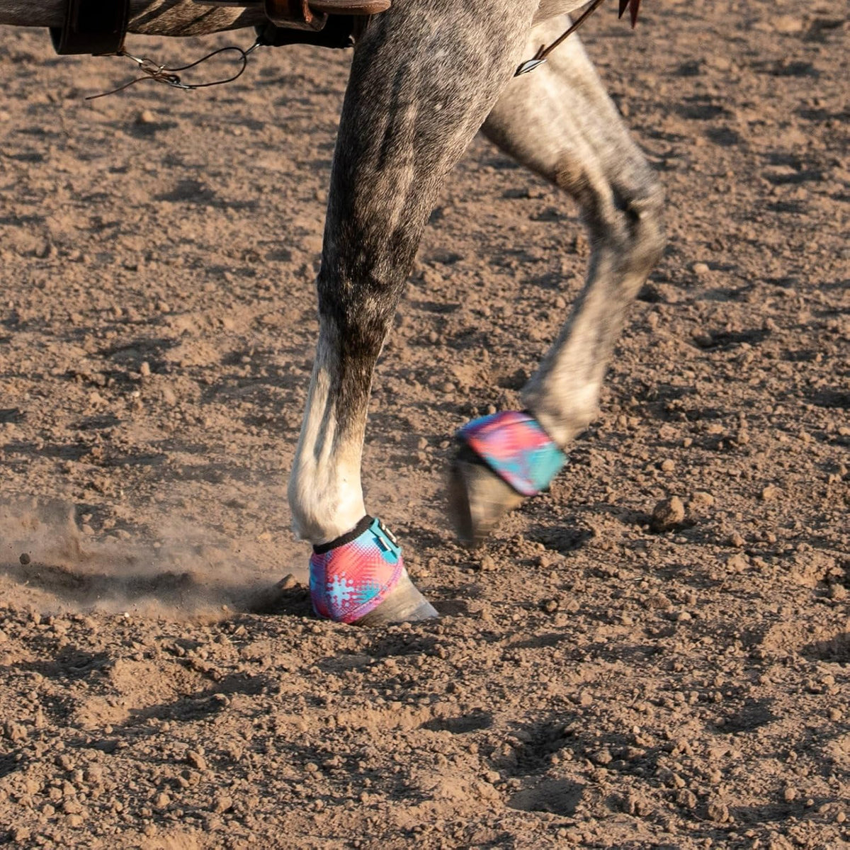 Side profile of the anatomically designed Classic Equine Dyno Turn horse boots in medium size.