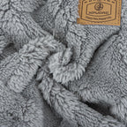 XPUDAC grey turtleneck pet jumpsuit showcasing the soft textured fleece material.