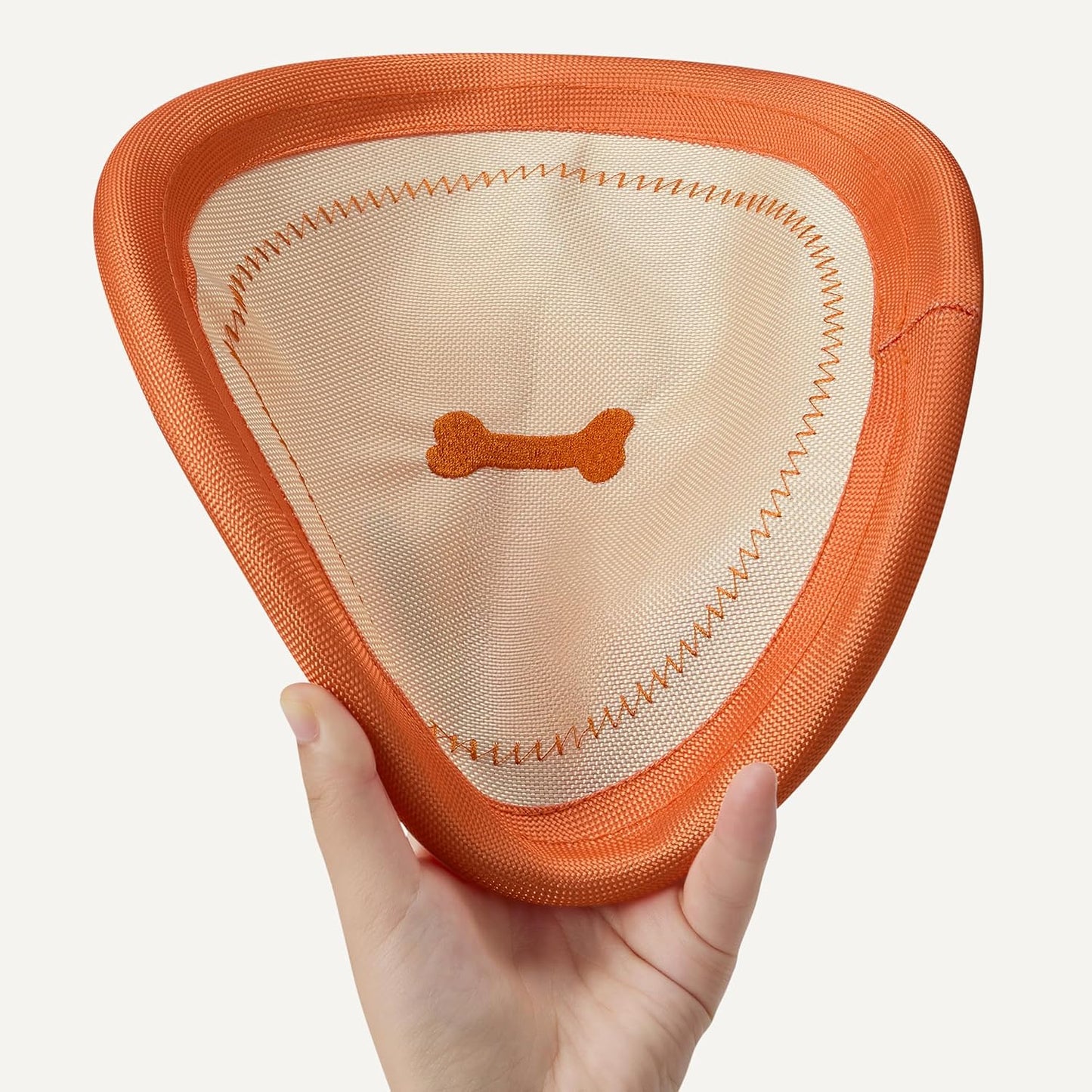 Side profile of durable water floating dog toy