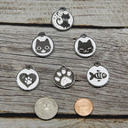 Polished metal pet identification tag with split ring attached
