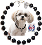 Hidden Hollow Beads pet collar necklace showing the detailed craftsmanship of the silver paw print charm
