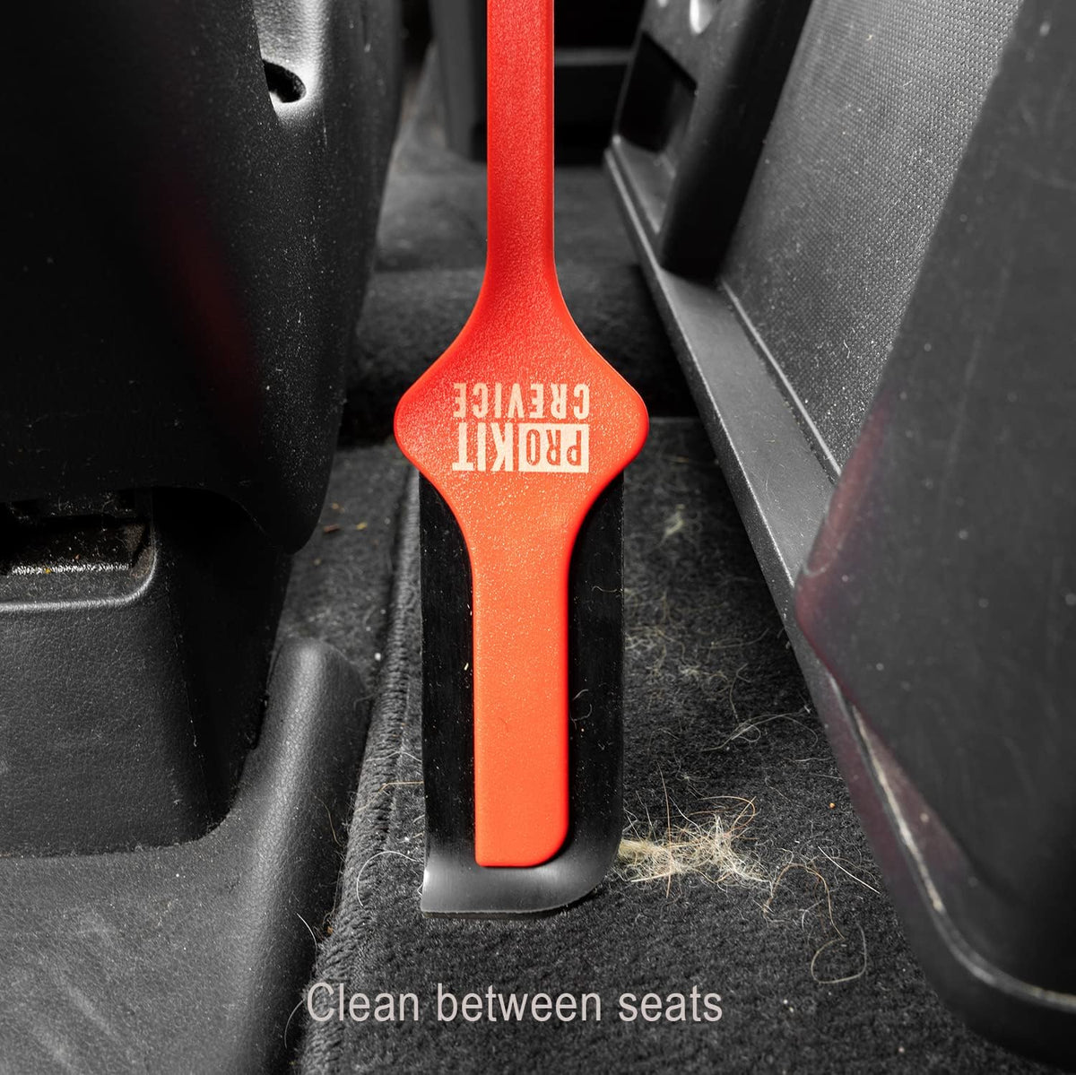 Using Lilly Brush to remove dog hair from car floor mats