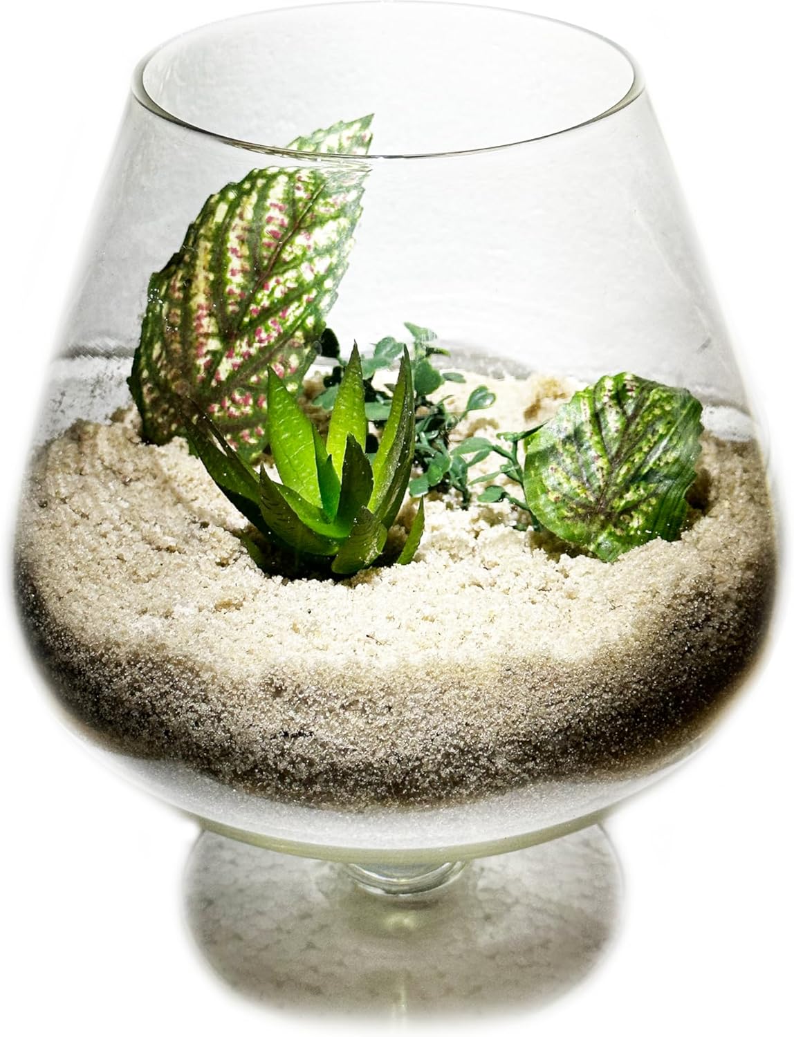 Close up of natural non toxic sand flowing through fingers for sensory play