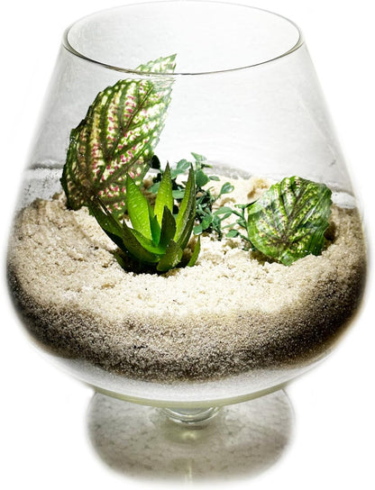 Close up of natural non toxic sand flowing through fingers for sensory play