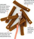 Dog eating a Crumps' Naturals Plaque Buster dental chew