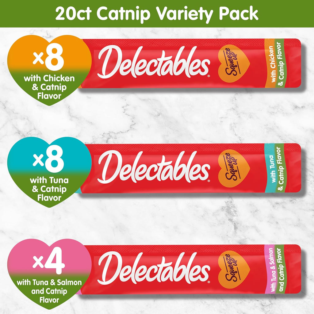 Squeezable wet puree cat topper applied over dry pet kibble