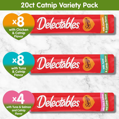 Squeezable wet puree cat topper applied over dry pet kibble