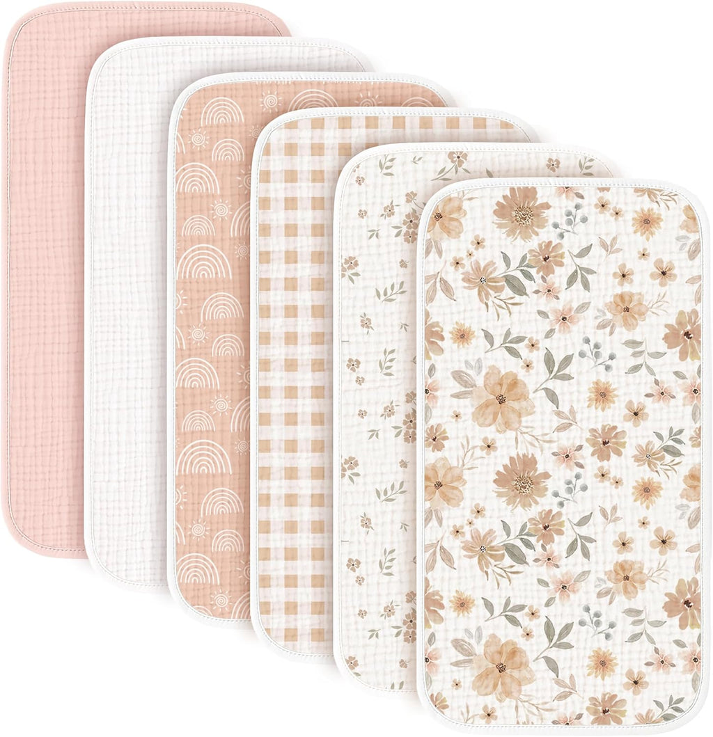 Konssy muslin baby burp cloths front view showing six folded pieces in classic unisex colors.
