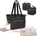 LUXJA breast pump bag in black quilted nylon showing the front view with gold zippers