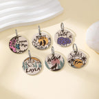 Round engraved cat collar holder tag shown with two attachment rings.