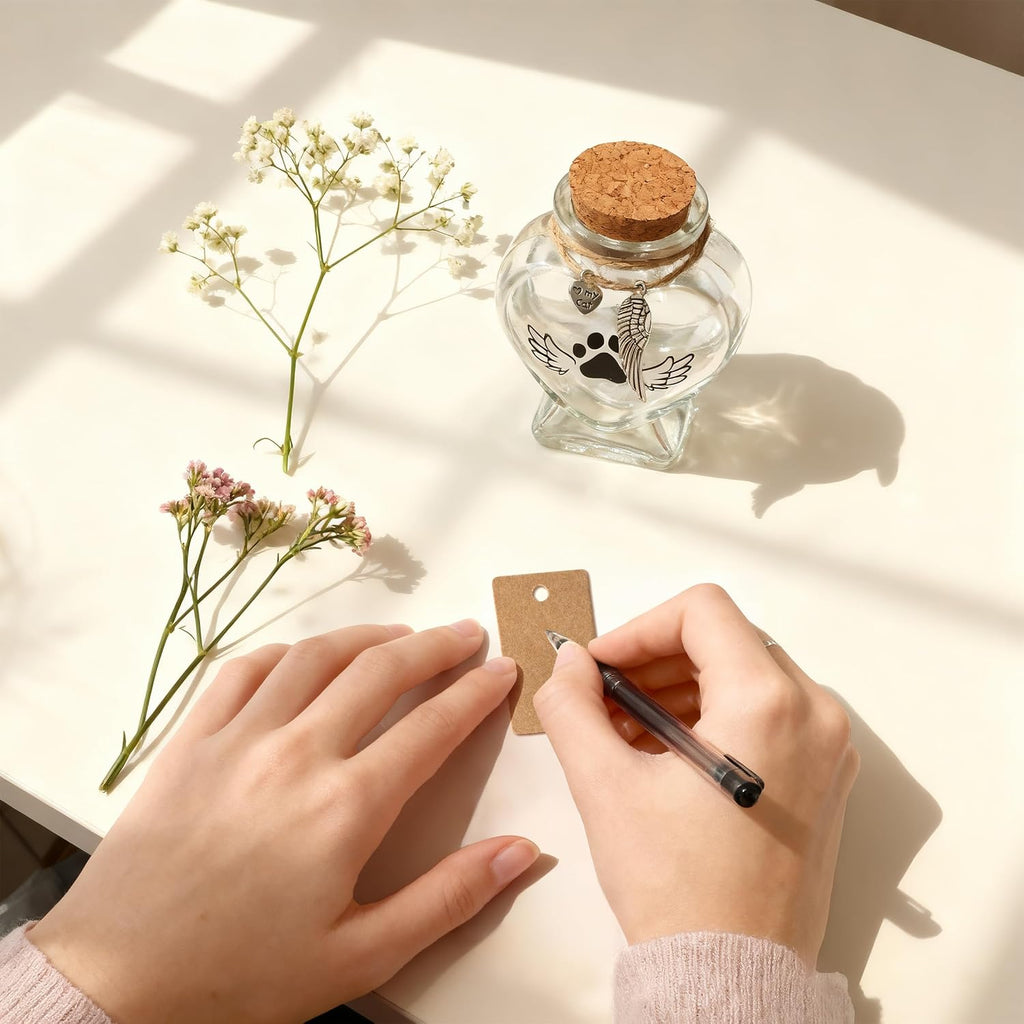 Close up view of the natural wood stopper and metal charms on HAMUIERS jar