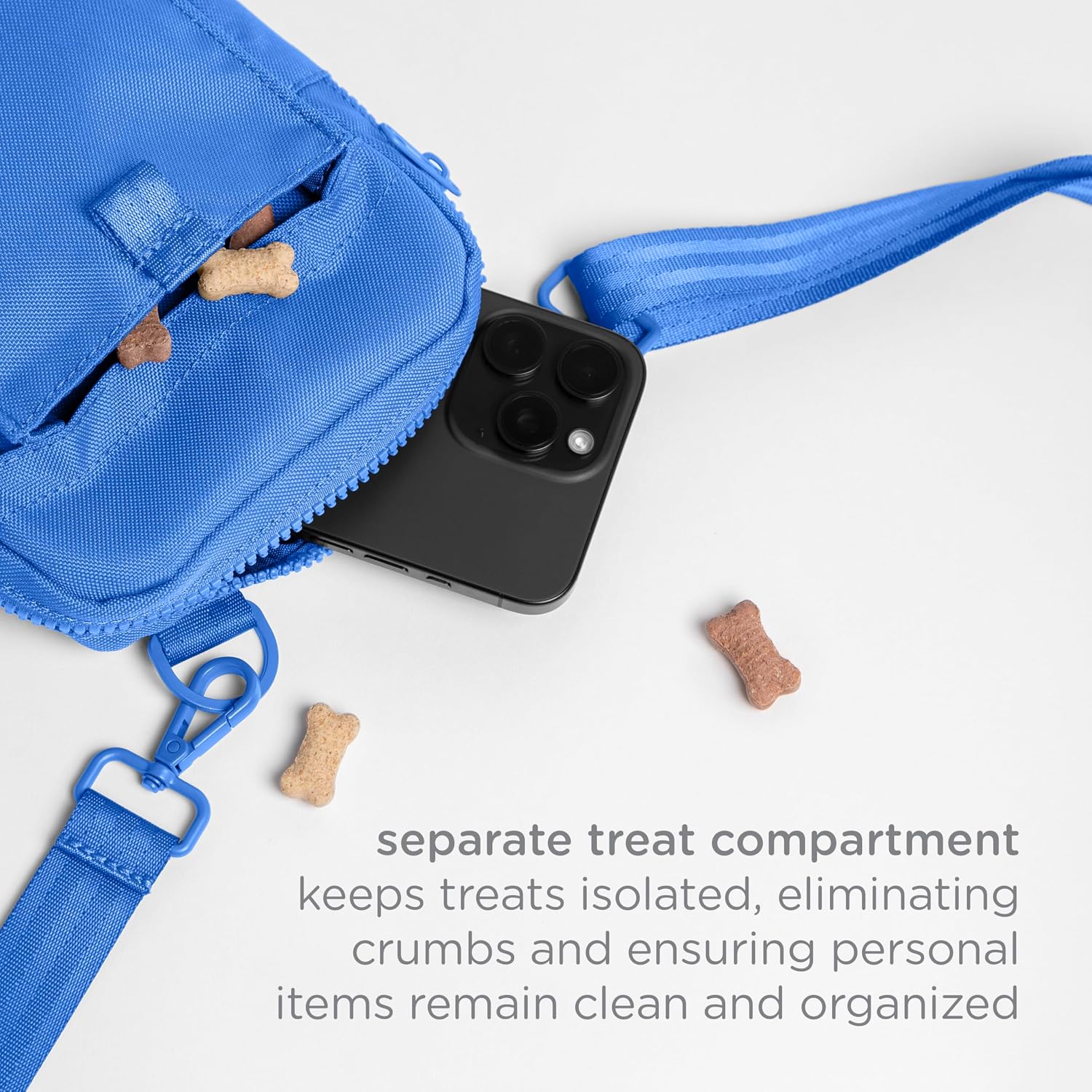 Eco friendly Ubbi dog accessory made from recycled plastic bottles shown in a lifestyle walking setting