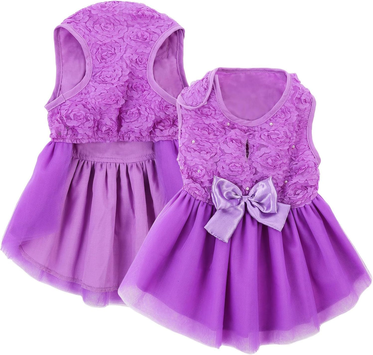 Small dog wearing navy blue princess lace birthday outfit