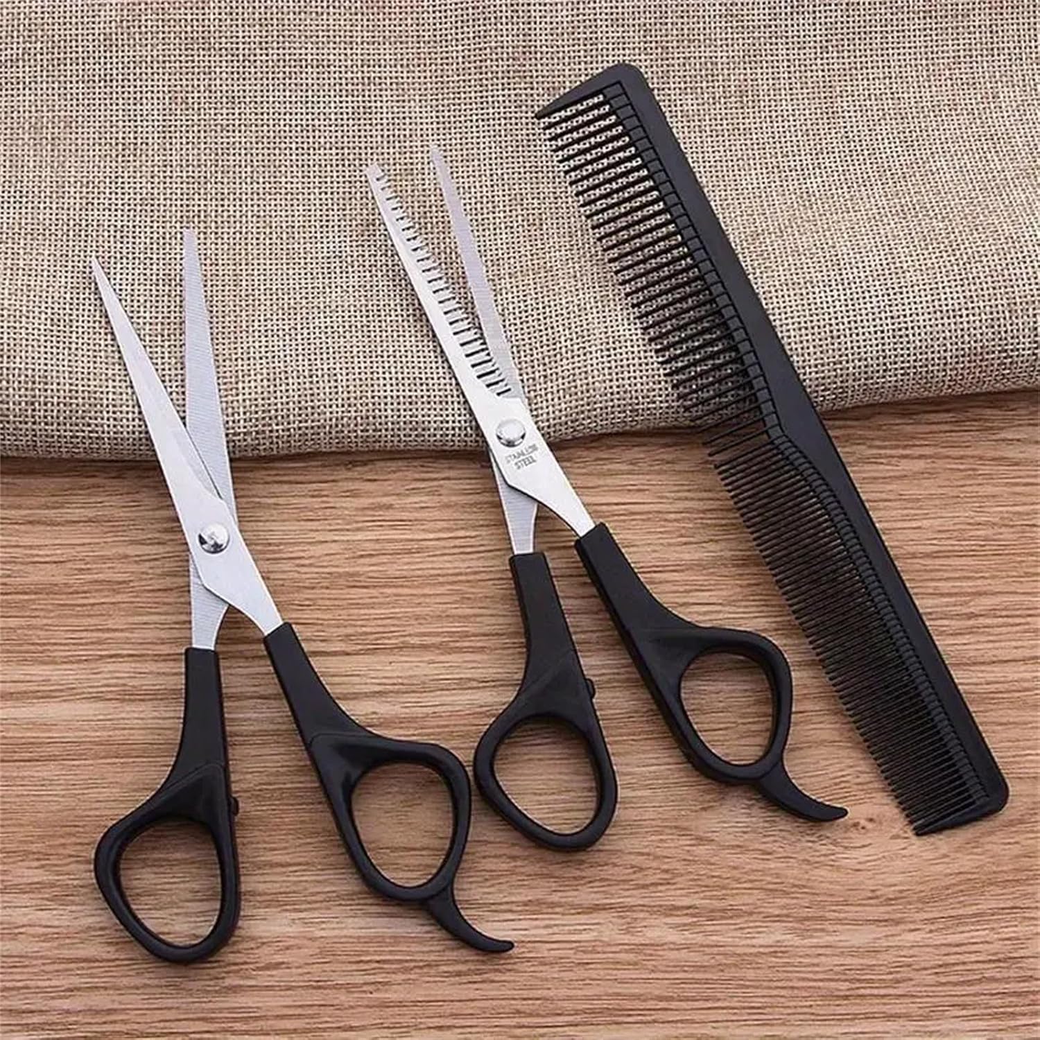 WOWITIS 3 piece hair cutting scissors set front view featuring stainless steel straight shears thinning scissors and black styling comb