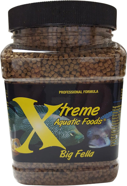 Xtreme Big Fella fish food next to a measuring spoon