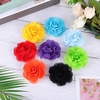 Assorted vibrant chiffon pet flower charms displaying thirty six unique color variants for dog and cat collars.