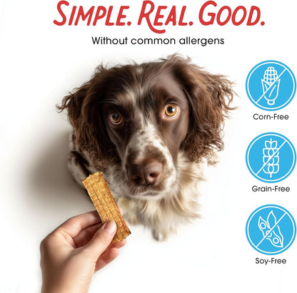 Dog eating Farmland Traditions chicken jerky treat