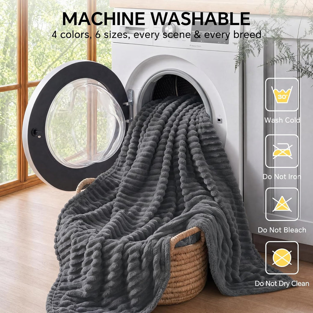 Reversible side of the Luciphia calming blanket on a bed.