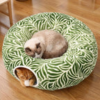 MEOWFIA Indoor Cat Tunnel Bed in Jungle Nest leaf pattern front view showing the plush central lounge cushion