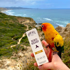 Hemp Well bird supplement bottle showing organic ingredients label