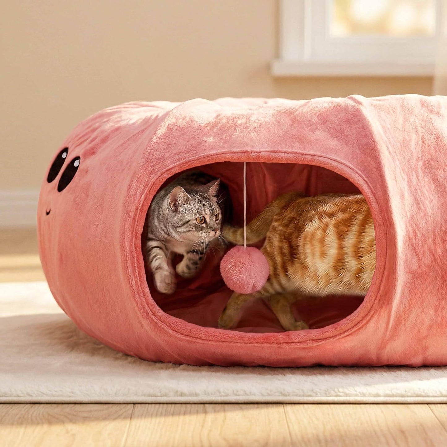 Collapsible pet tunnel with twenty included interactive kitten toys scattered around