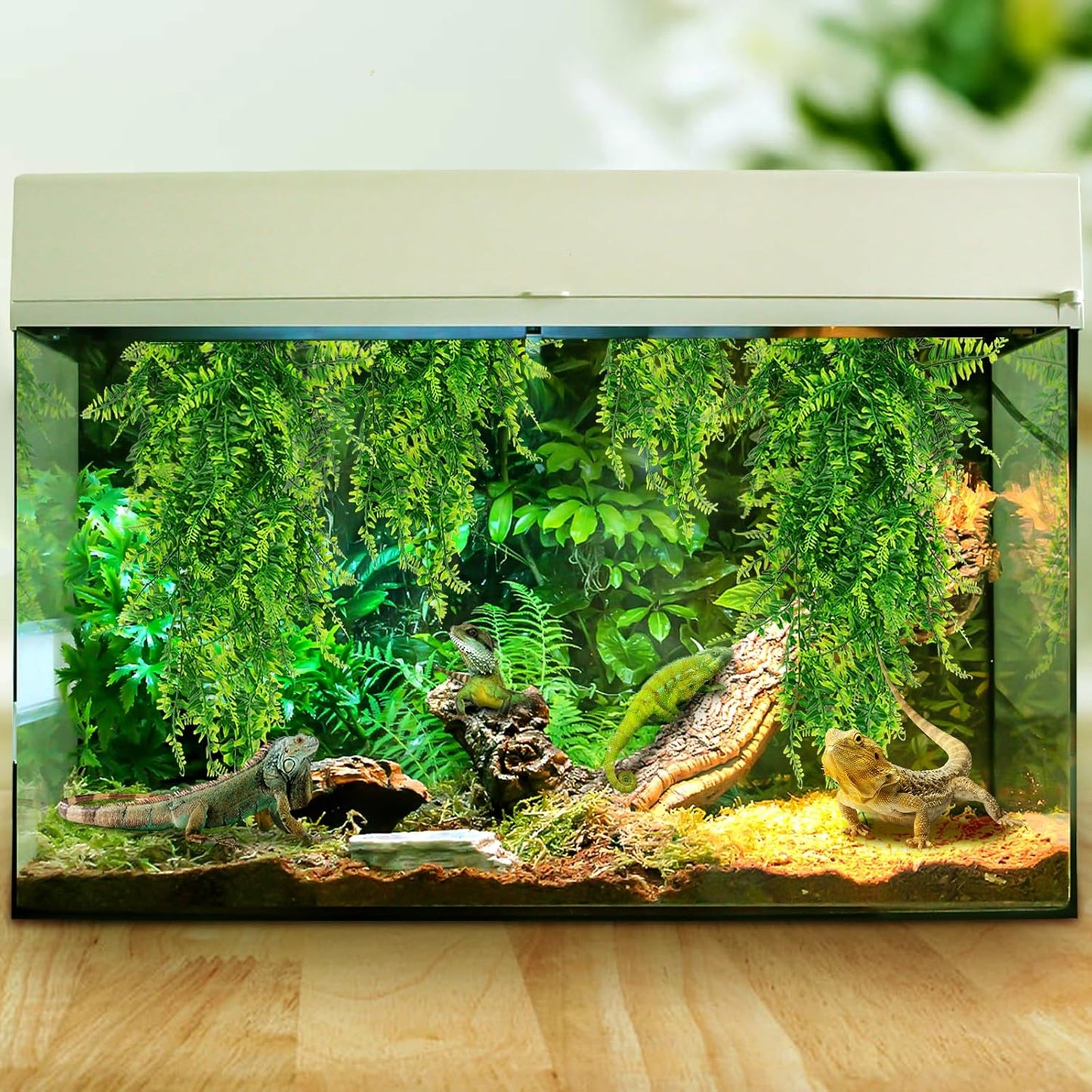 Quozuo artificial greenery setup inside a bearded dragon tank.