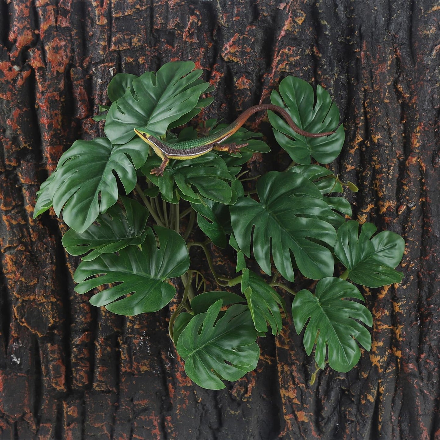 Artificial plant in a bearded dragon enclosure