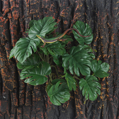 Artificial plant in a bearded dragon enclosure
