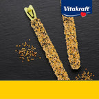 Canary eating Vitakraft Egg and Honey Crunch Stick