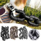 Funny big chain dog leash worn by a small puppy