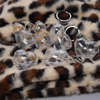 Six pieces of BTYYIHEX clear acrylic cat shaped fur holder bottles with elegant gold keyrings arranged on a neutral background.