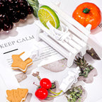 Chengu food clips attached to vertical bird cage bars