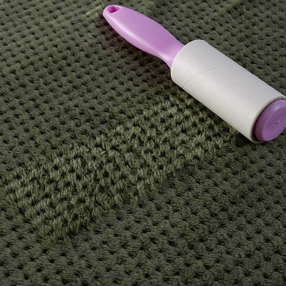 CUTEMATE durable polyester microfiber puppy blanket being folded for travel convenience.