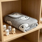 USA imported high quality pet blanket spread out on a bed.