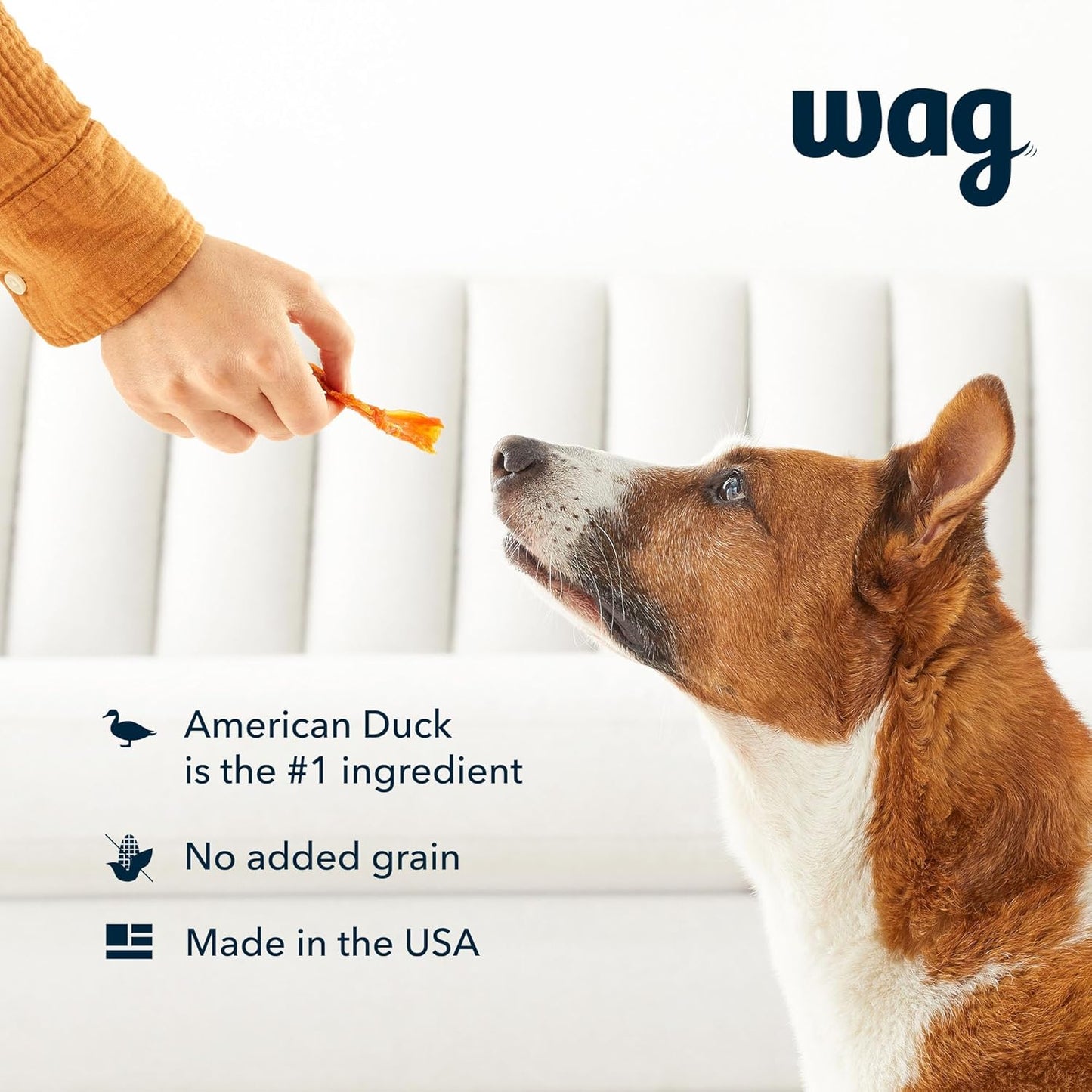 Close up of Wag duck jerky dog treats in a bowl