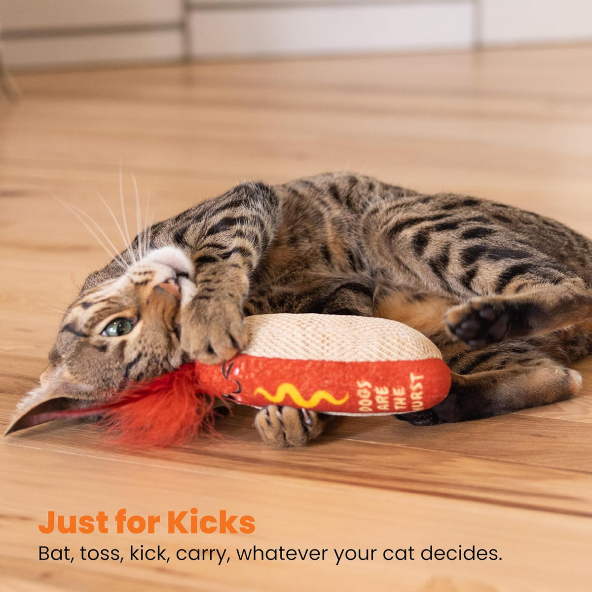 Catstages dental kicker toy demonstrating the elongated shape designed for bunny kicks.