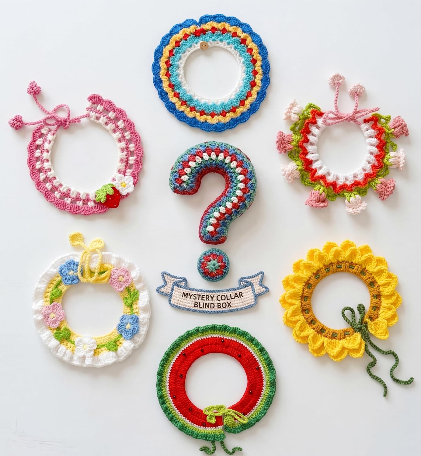 Pawified Mystery Cat Collar Box front view featuring a colorful handmade knitted flower pet accessory.