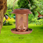 Tepaken solar powered bird feeder illuminating a patio landscape at night