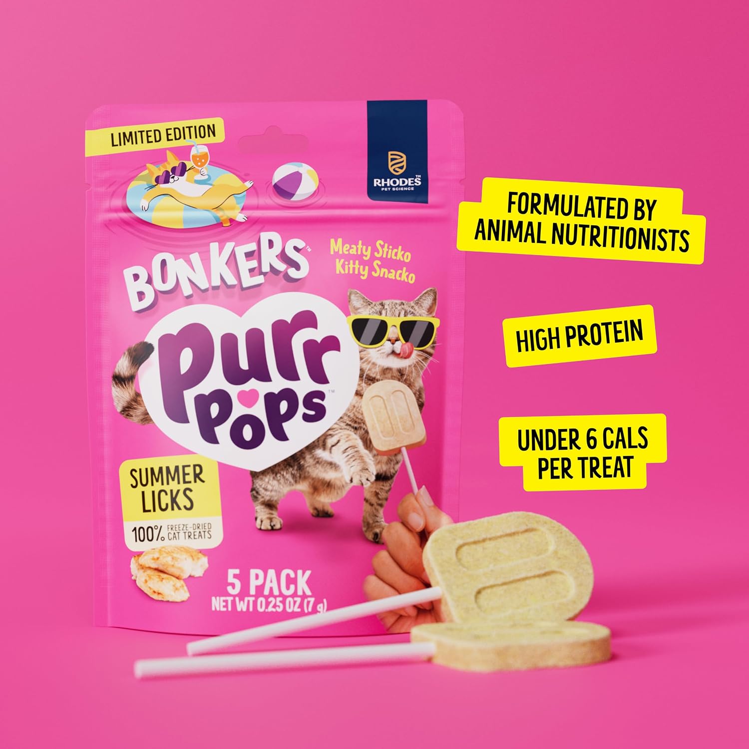 Cat enjoying a Bonkers Purrpops freeze dried chicken treat
