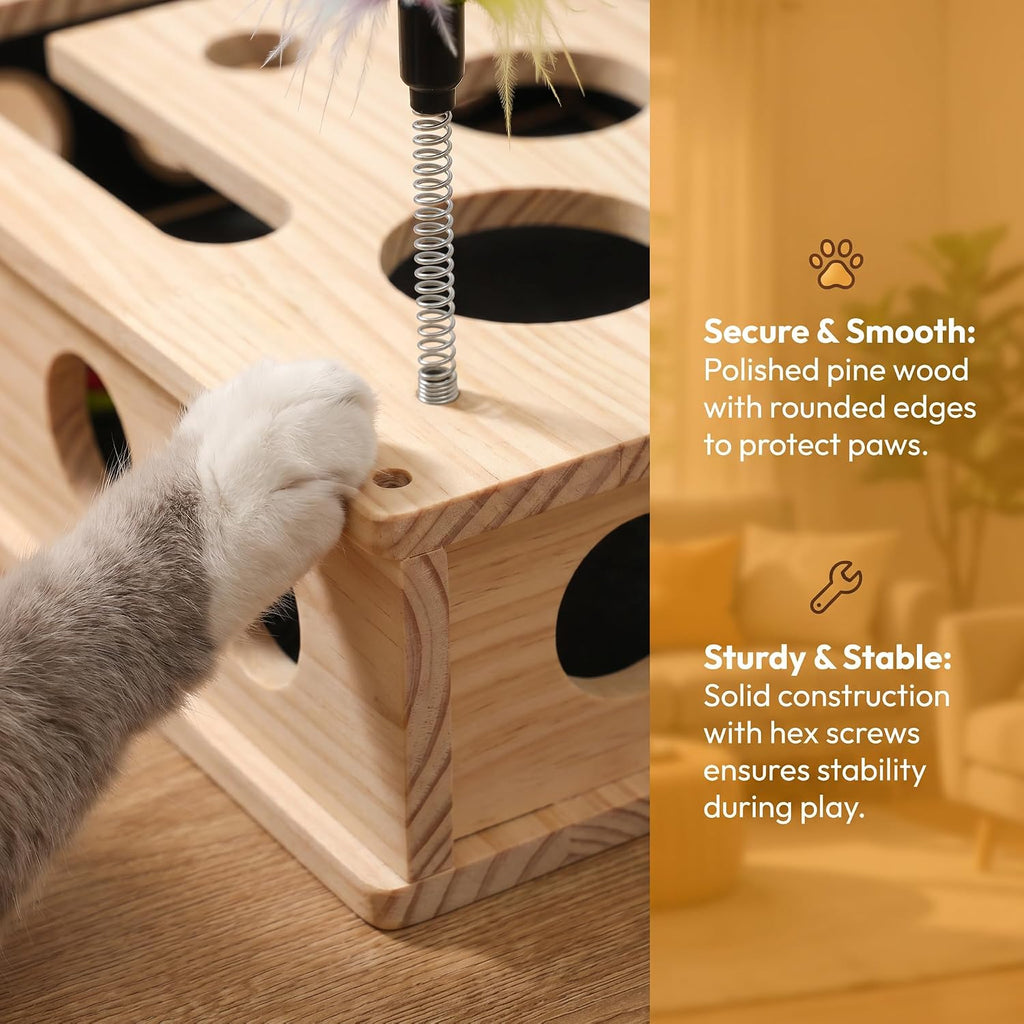 Indoor feline playing with a wooden puzzle feeder and natural nail file box