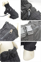 Premium outdoor dog jacket with leash opening close up detail