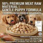 Small hand holding McLovin's freeze dried chicken treat for training